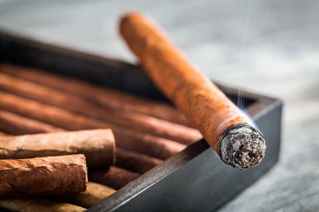 Cigars on a wooden table.